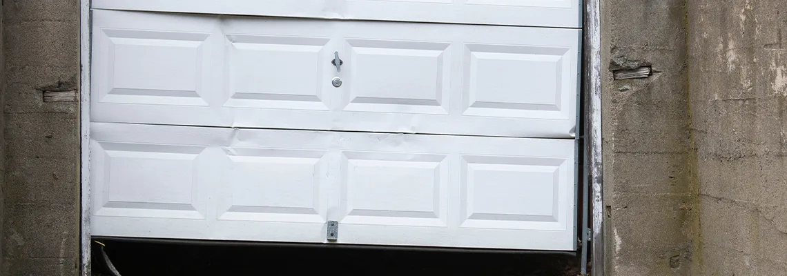 Garage Door Got Hit By A Car Dent Removal in Bartlett, IL