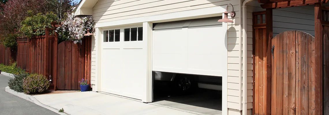 Fix Metal Garage Door Jerking in Bartlett, Illinois